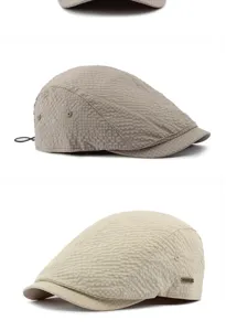 Detailed side view of a breathable jacquard cotton flat cap for outdoor sun protection