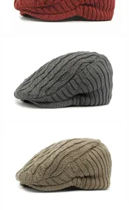 Warm autumn winter knitted beret flat caps in grey and khaki colors with retro style