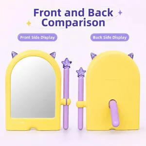 Cute yellow desktop makeup mirror with purple star wand accent and standing support