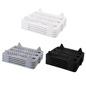 Set of stackable plastic clothes folding boards in white grey and black for closet organization
