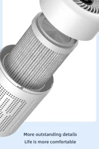 Détail du filtre HEPA multicouche à l'intérieur d'un purificateur d'air blanc.