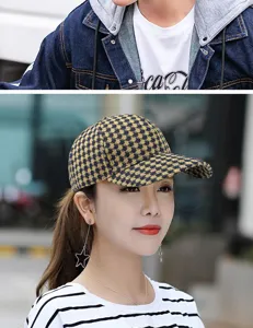 Close-up view of a stylish houndstooth pattern baseball cap worn by a female model outdoors
