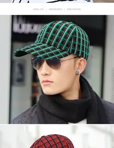 Stylish green and black plaid baseball cap worn by a male model for sun protection.