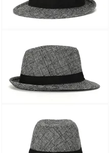 Detail view showing the woven texture and black band of a grey plaid trilby hat.