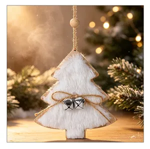 Detail view of a wooden Christmas tree ornament with white faux fur and silver bells