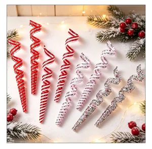 Detail showing variety of red and white glittery spiral Christmas candy ornaments.