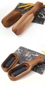 Detailed close-up showing the acacia wood texture and black stainless steel cheese grater
