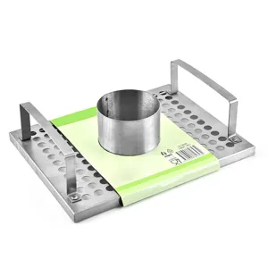 Detailed view of stainless steel chicken roaster with beer can cylinder and handles