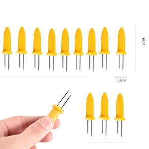 Detailansicht der gelben Maiskolbenhalter mit einer Länge von 6 cm und Edelstahlzinken