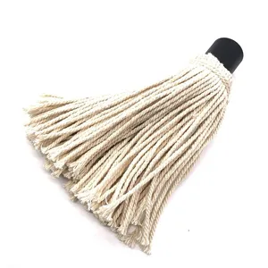 Detailed view of a professional white pure cotton BBQ mop brush head for basting sauce.