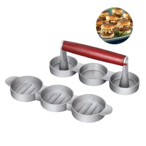 Detail view of a professional 3-patty mini burger press with wooden handle and ribbed base
