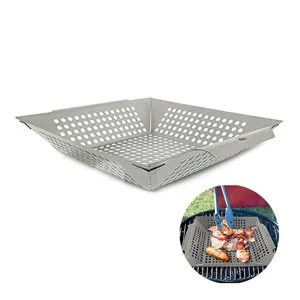 Stainless steel square grill pan detail showing perforated basket design and usage on BBQ.