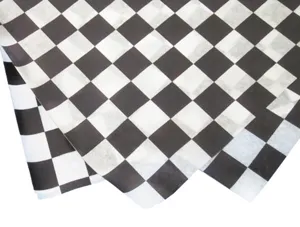 Detail macro view showing the texture of black and white checkered greaseproof paper