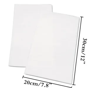 Close-up detail of 500pcs food grade greaseproof wax paper showing 30x20cm dimensions