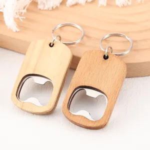 Close-up of minimalist oak wood bottle opener keychains with stainless steel insert
