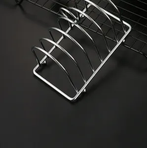 Macro view of a silver electroplated metal bread rack for sandwich toast slices