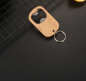 Close-up of portable oak bottle opener with stainless steel keychain ring