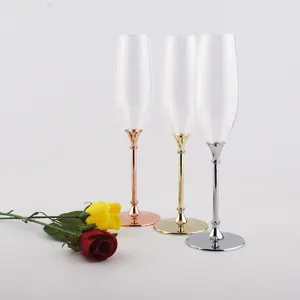 Set of champagne flutes with elegant rose gold, gold, and silver metallic stems