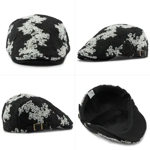 Women's vintage floral jacquard flat cap beret in black and white knit winter hat