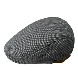 Classic grey houndstooth flat cap newsboy hat with adjustable brown side strap for men