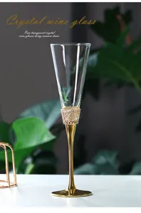 Elegant champagne flute with a golden crystal-encrusted stem and slanted rim design
