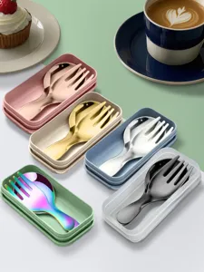 Detailed view of colorful stainless steel spork sets in portable storage cases