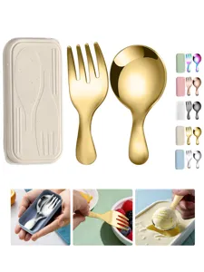 Detail view of portable children's gold stainless steel fork and spoon set with storage box.