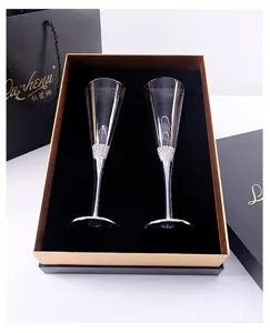 Set of 2 luxury slanted champagne flutes with rhinestone accents in a black gold gift box