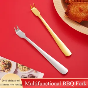 Two 304 stainless steel BBQ meat forks in gold and silver on a red background
