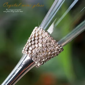 Elegant luxury crystal champagne glass featuring a sparkling rhinestone embellished stem