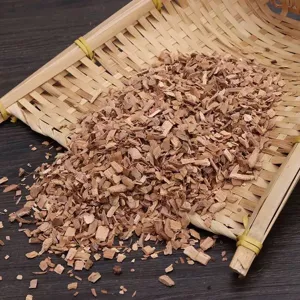 High-quality natural cherry and hickory wood chips for smoking food on a bamboo tray