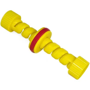 Detail showing the spiral design of a yellow plastic sausage and hot dog slicer