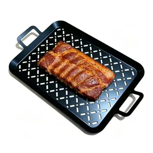Detail view of a black 430 stainless steel BBQ grill pan with roasted meat on it