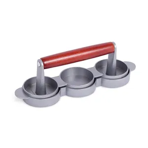 Side view detail of a 3-cavity stainless steel hamburger press with red wooden handle