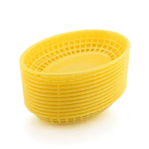 Detailed view of stackable yellow oval plastic baskets for fast food service storage