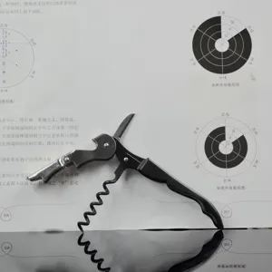 Close-up of a professional black waiter's friend corkscrew wine opener on wine guide
