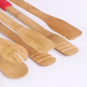 Close-up of natural bamboo kitchen tongs set showing textures and various head designs.