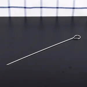 Detail of a 30cm heavy-duty stainless steel BBQ skewer with a round needle design