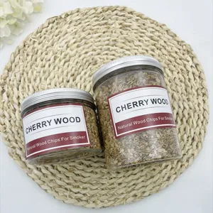 High-quality natural cherry wood chips for smoking food, presented in two jars