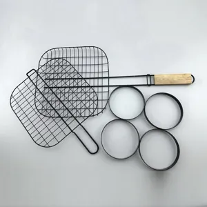 Black non-stick BBQ grill set including burger patty press and four round molds