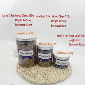 Three jars of natural apple wood chips for smoking in various sizes and weights