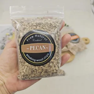 Detailed view of natural pecan smoking wood chips in a bag for cocktail infusion