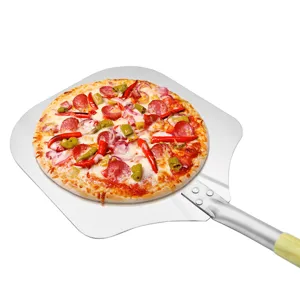 Professional 12-inch aluminum pizza peel with oak handle carrying a freshly baked pizza
