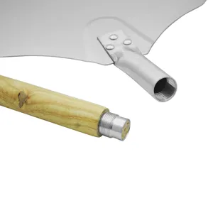 Close-up of the detachable screw-on connection of the aluminum pizza peel with oak handle