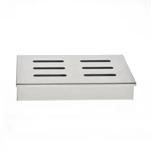 Detail view of rectangular stainless steel BBQ smoker box with six ventilation slots