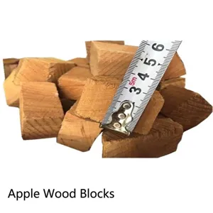 Close-up detail of natural apple wood chunks for BBQ smoking with measuring tape scale