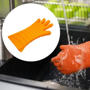 Guanto di pulizia in silicone arancione ispessito con texture antiscivolo ondulata per cucina.
