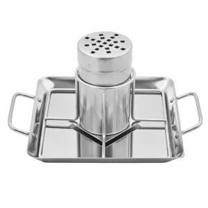 Detail view of stainless steel beer can chicken roaster with drip tray and handles