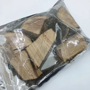 Natural assorted BBQ smoking wood chunks for meat inside a clear 500g sealing bag