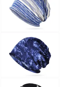 Detailed view of tie-dye and striped slouchy beanies in soft cotton fabric